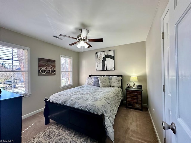 carpeted bedroom featuring ceiling fan