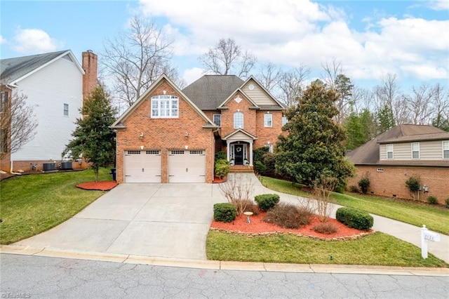 traditional-style house featuring brick siding, an attached garage, concrete driveway, and a front lawn