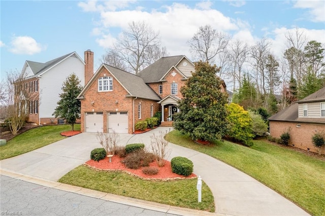 traditional-style house with an attached garage, a chimney, a front lawn, concrete driveway, and brick siding