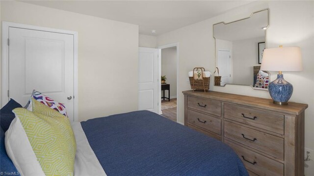 bedroom featuring light hardwood / wood-style floors