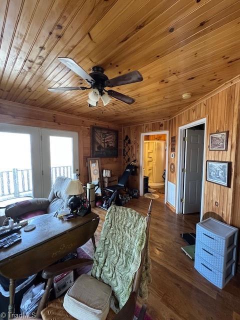 197 Mahogany Ct, Lansing, NC 28643 - dining area featuring wood finished floors, wood walls, wood ceiling, and ceiling fan