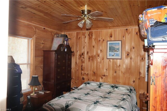 197 Mahogany Ct, Lansing, NC 28643 - bedroom with wooden walls, wooden ceiling, and multiple windows
