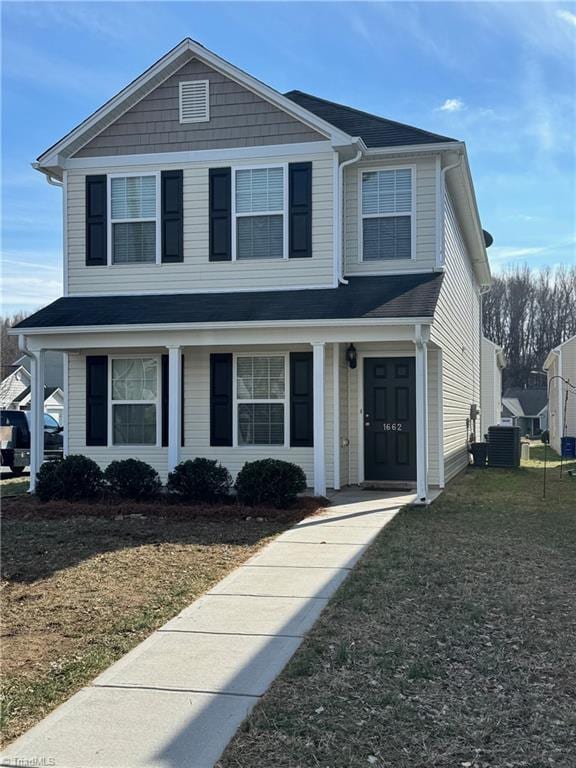 view of front property with a front lawn