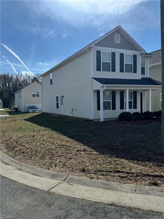 view of property exterior with a lawn