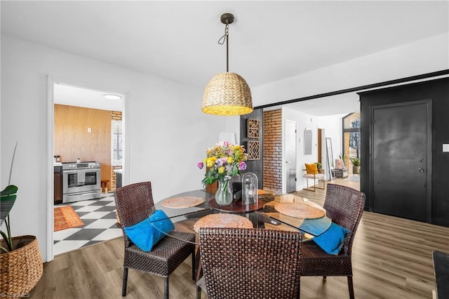 dining space featuring wood finished floors