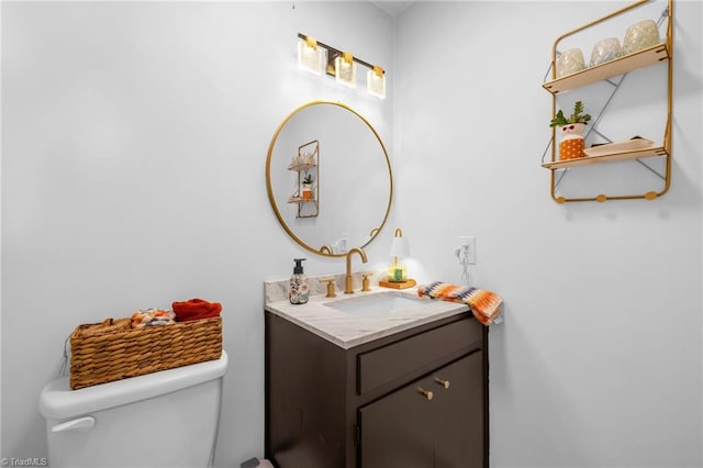 half bath with vanity and toilet