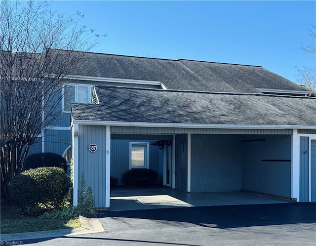 garage featuring a carport