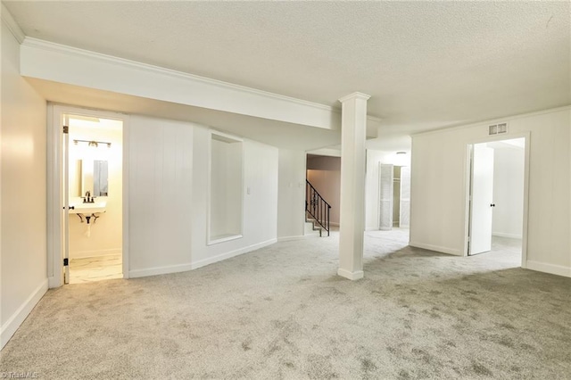 carpeted empty room with crown molding