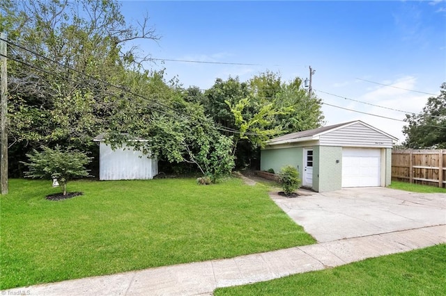 view of yard with an outdoor structure and a garage