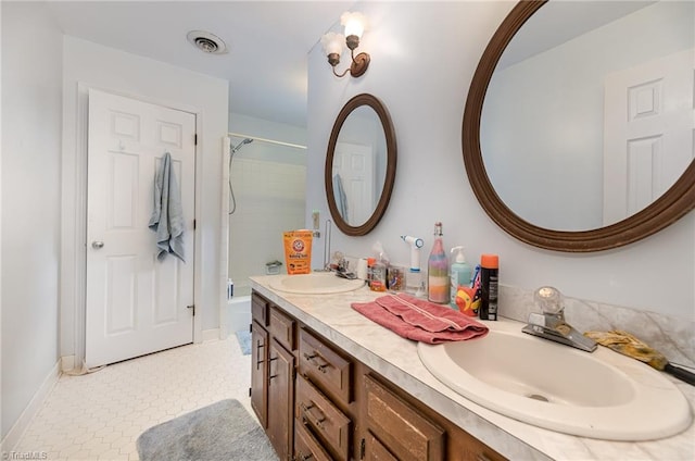 full bath featuring bathtub / shower combination, visible vents, a sink, and double vanity