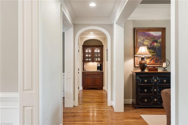 5459 Brookberry Farm Rd, Winston-Salem, NC 27106 - corridor with light wood-style flooring, crown molding, arched walkways, and baseboards