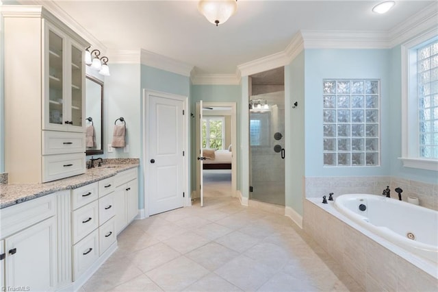 5459 Brookberry Farm Rd, Winston-Salem, NC 27106 - ensuite bathroom featuring a garden tub, vanity, a shower stall, crown molding, and tile patterned flooring