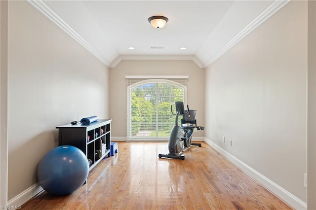 5459 Brookberry Farm Rd, Winston-Salem, NC 27106 - exercise area featuring wood finished floors, baseboards, vaulted ceiling, and ornamental molding