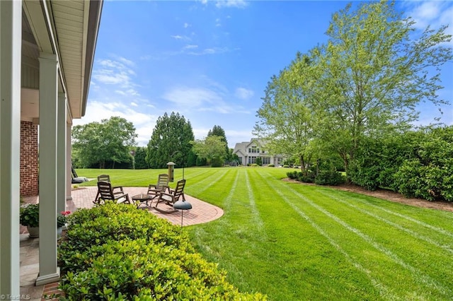 5459 Brookberry Farm Rd, Winston-Salem, NC 27106 - view of green lawn featuring a patio area