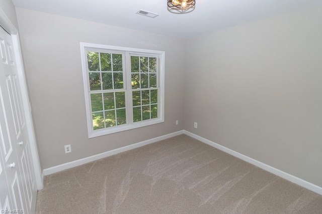 7905 Cress Ct, Oak Ridge, NC 27310 - carpeted spare room with baseboards