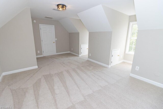 7905 Cress Ct, Oak Ridge, NC 27310 - bonus room featuring carpet, lofted ceiling, and baseboards