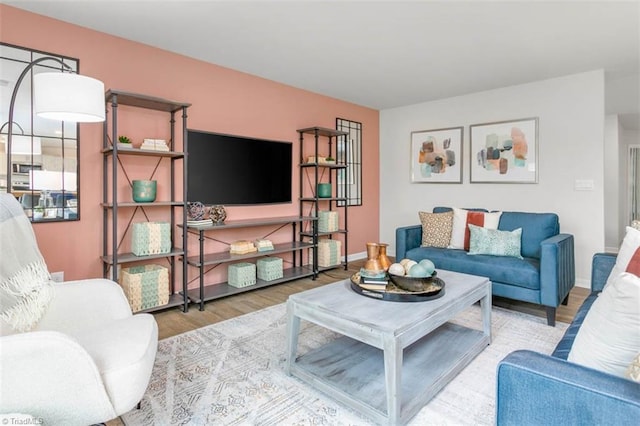 living room with light hardwood / wood-style floors