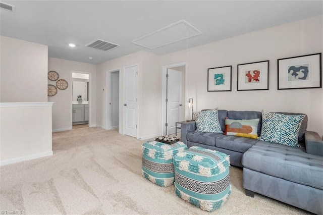 living room featuring light carpet