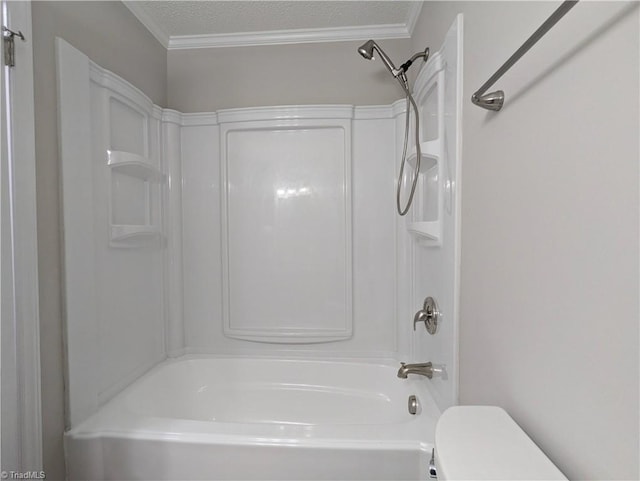 full bath featuring toilet, ornamental molding, a textured ceiling, and shower / washtub combination