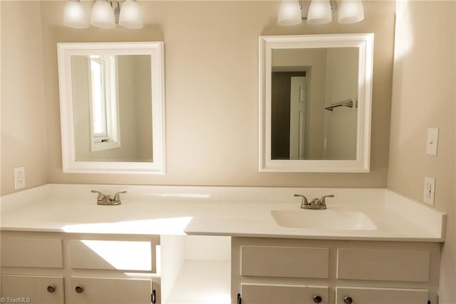 bathroom featuring double vanity