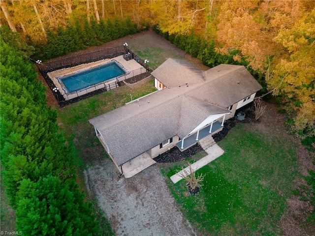 view of subject property featuring a pool area