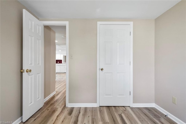 207 Bingham St, Carthage, NC 28327 - unfurnished bedroom featuring light wood finished floors and baseboards