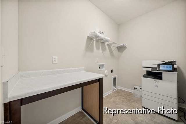 clothes washing area featuring washer hookup, laundry area, hookup for an electric dryer, and baseboards