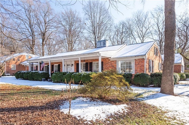 single story home with covered porch