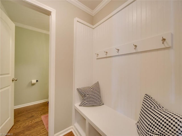 mudroom featuring ornamental molding and hardwood / wood-style floors