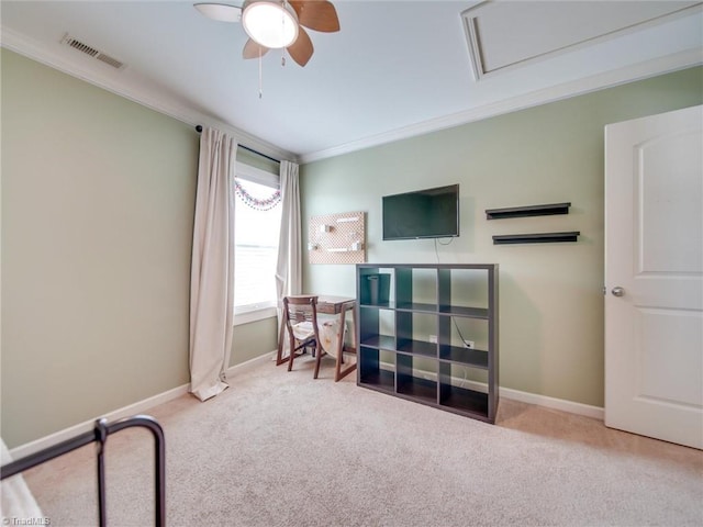 interior space with light carpet, ceiling fan, and crown molding