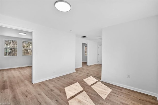 empty room featuring light hardwood / wood-style floors