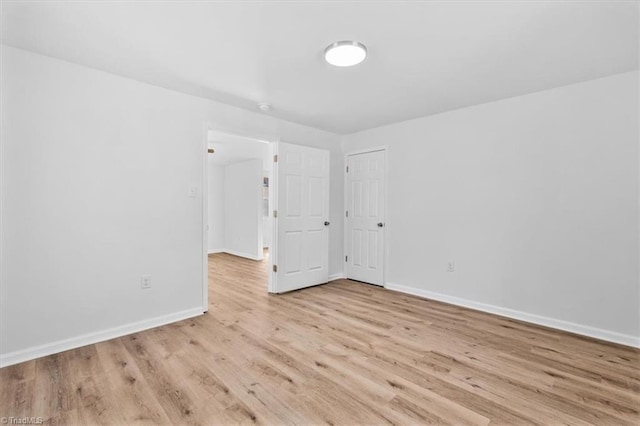 empty room featuring light hardwood / wood-style floors