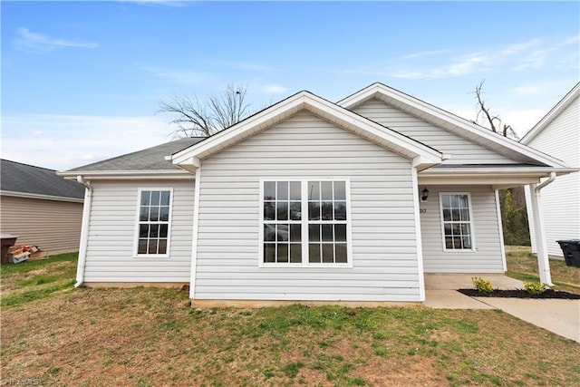 3217 N Ohenry Blvd, Greensboro, NC 27405 - rear view of house featuring a patio area and a lawn