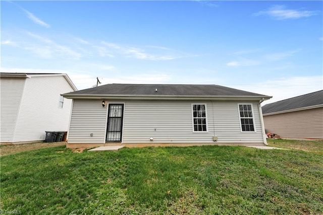 3217 N Ohenry Blvd, Greensboro, NC 27405 - rear view of property with a yard