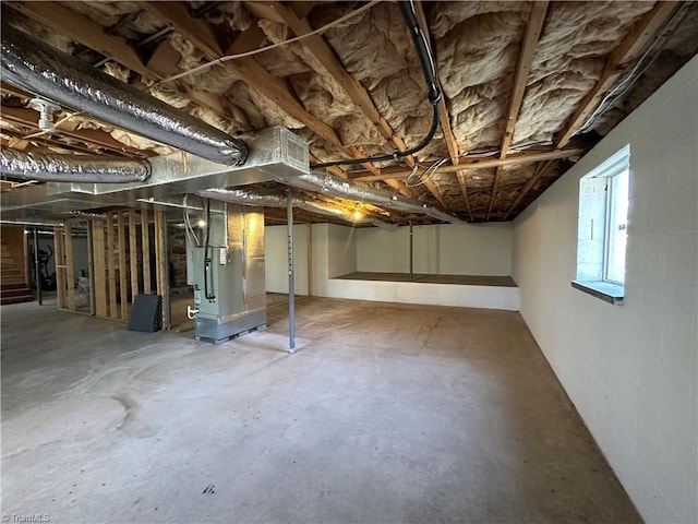 basement featuring heating unit