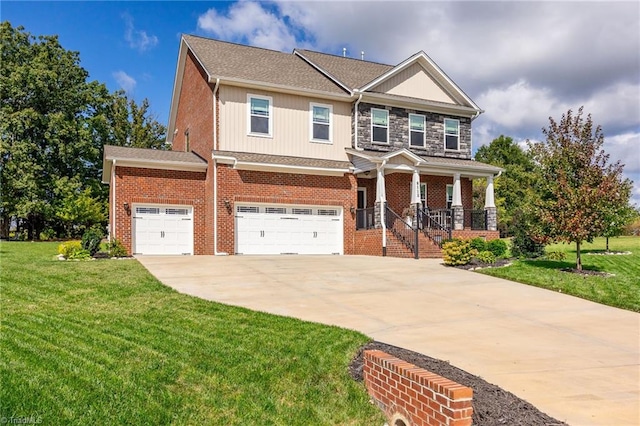 craftsman-style home with a front lawn, covered porch, and a garage