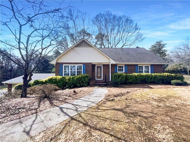 ranch-style home with a front yard