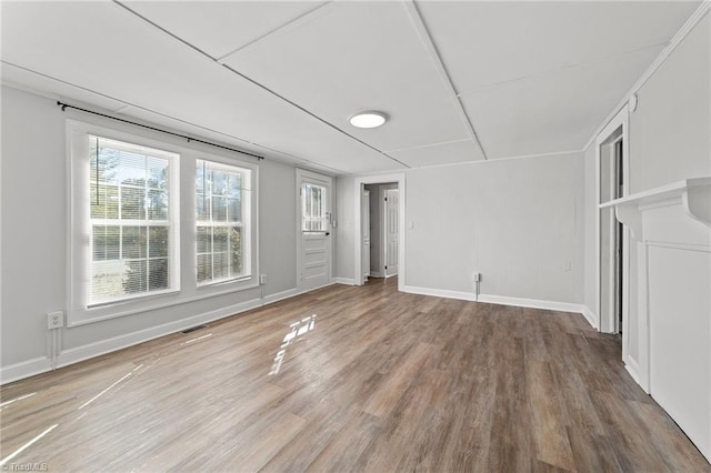 unfurnished room featuring hardwood / wood-style floors