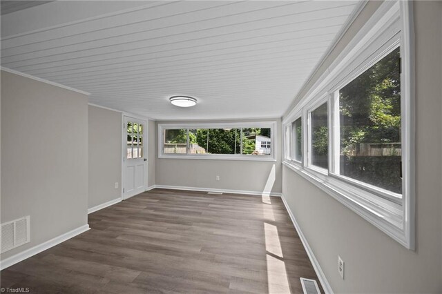 4108 Walker Ave, Greensboro, NC 27407 - unfurnished sunroom featuring wood finished floors and ornamental molding