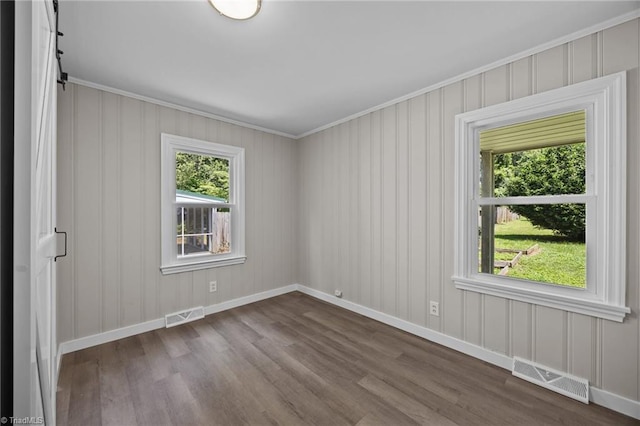 4108 Walker Ave, Greensboro, NC 27407 - unfurnished room with dark wood-style flooring and crown molding