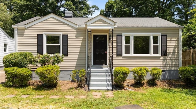 4108 Walker Ave, Greensboro, NC 27407 - bungalow-style house with crawl space and a chimney