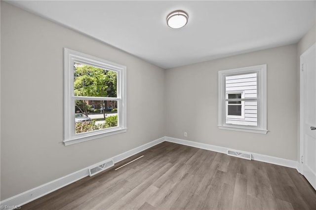 4108 Walker Ave, Greensboro, NC 27407 - unfurnished room with wood finished floors and baseboards