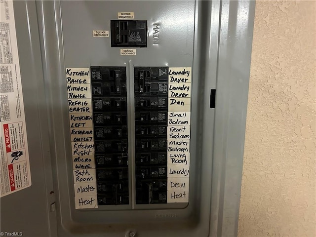 utility room featuring electric panel