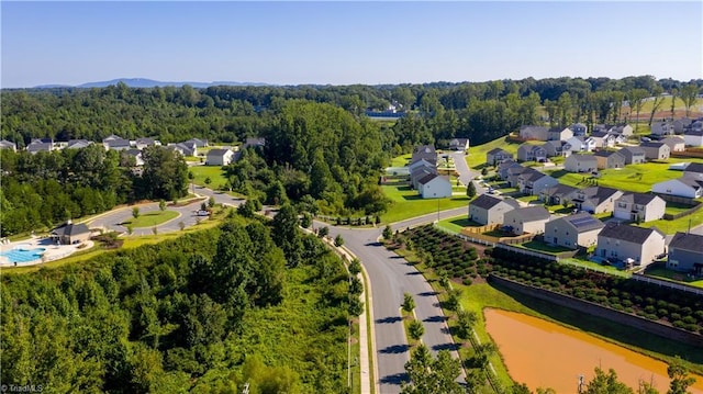 977 Bosemon St, Rural Hall, NC 27045 - aerial perspective of suburban area featuring a heavily wooded area