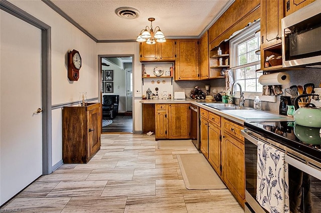 kitchen with visible vents, brown cabinetry, appliances with stainless steel finishes, open shelves, and a sink