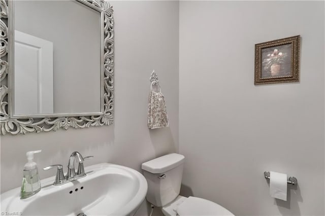 151 Outrigger Ln, Troutman, NC 28166 - half bath featuring a sink and toilet