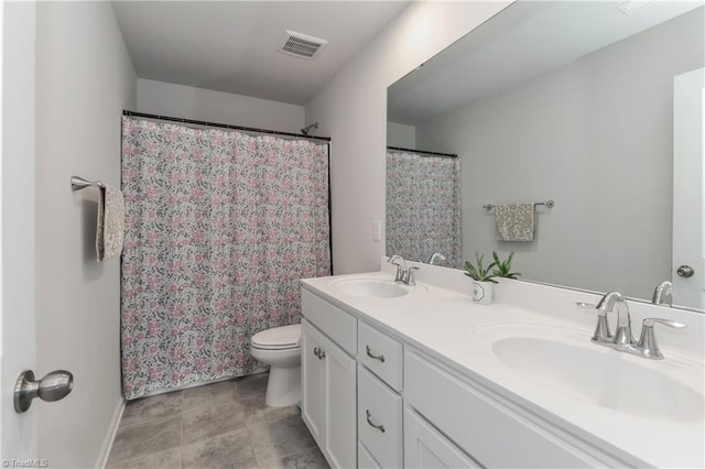 151 Outrigger Ln, Troutman, NC 28166 - full bathroom with toilet, double vanity, baseboards, and a shower with shower curtain
