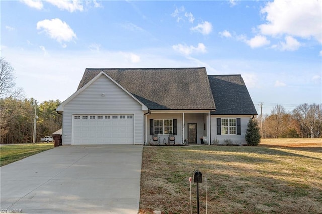 view of front facade featuring concrete driveway, roof with shingles, an attached garage, and a front yard