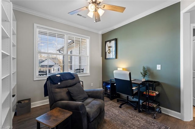 office with baseboards, crown molding, visible vents, and wood finished floors