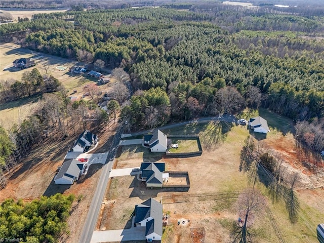 aerial view featuring a forest view